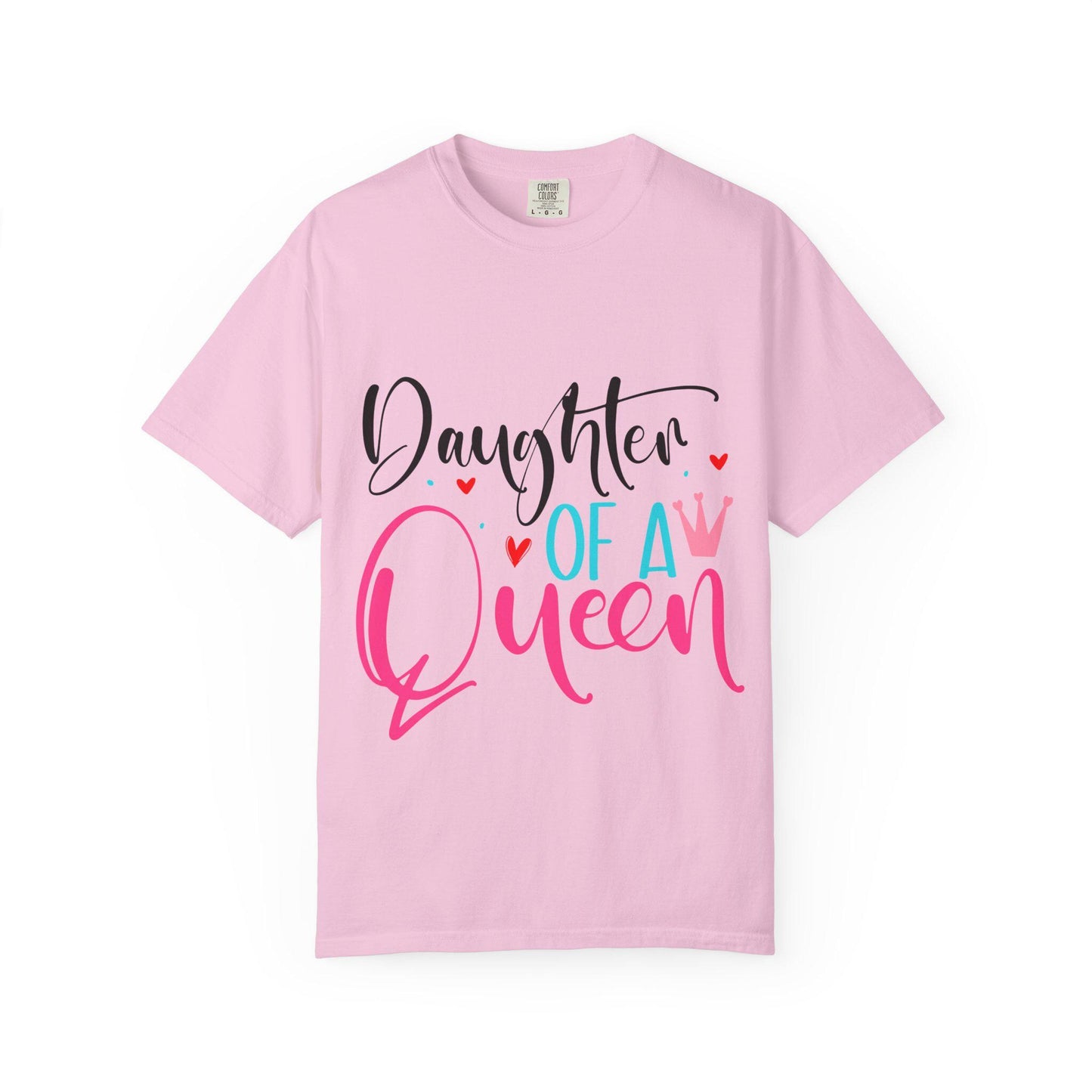 Pink-colored Comfort Colors short sleeve t-shirt with the bold and colorful phrase “Daughter of a Queen” in playful script. The design features a mix of black, pink, and aqua lettering, with decorative red hearts and a pink crown accent. This empowering and stylish tee celebrates strong mother-daughter bonds and makes a perfect gift for daughters of all ages who embrace their royal roots with confidence and love.
