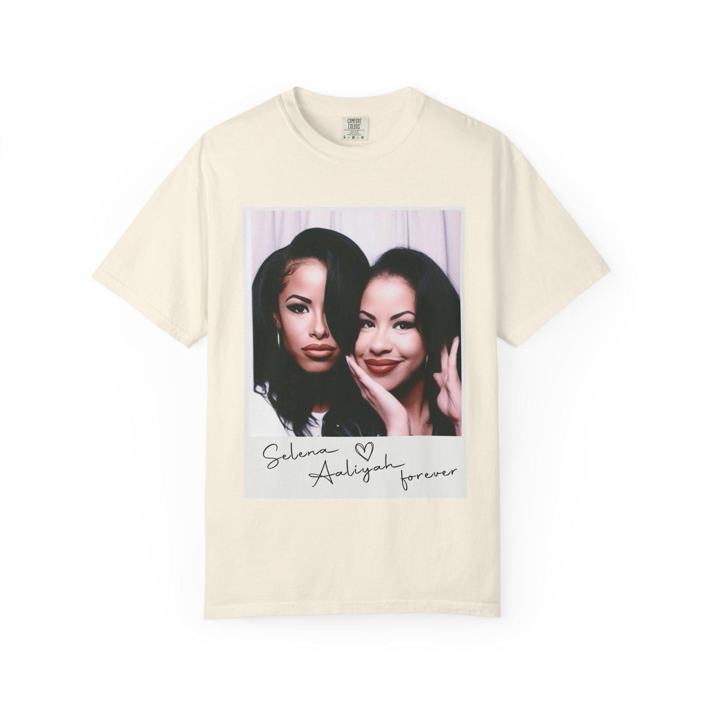 May include: Ivory t-shirt with a photo of two women in a Polaroid frame. The text below the photo reads 'Selena Aaliyah forever'.